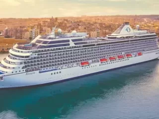 Oceania cruise ship in harbour - Sharon Carr Travel, Dallas