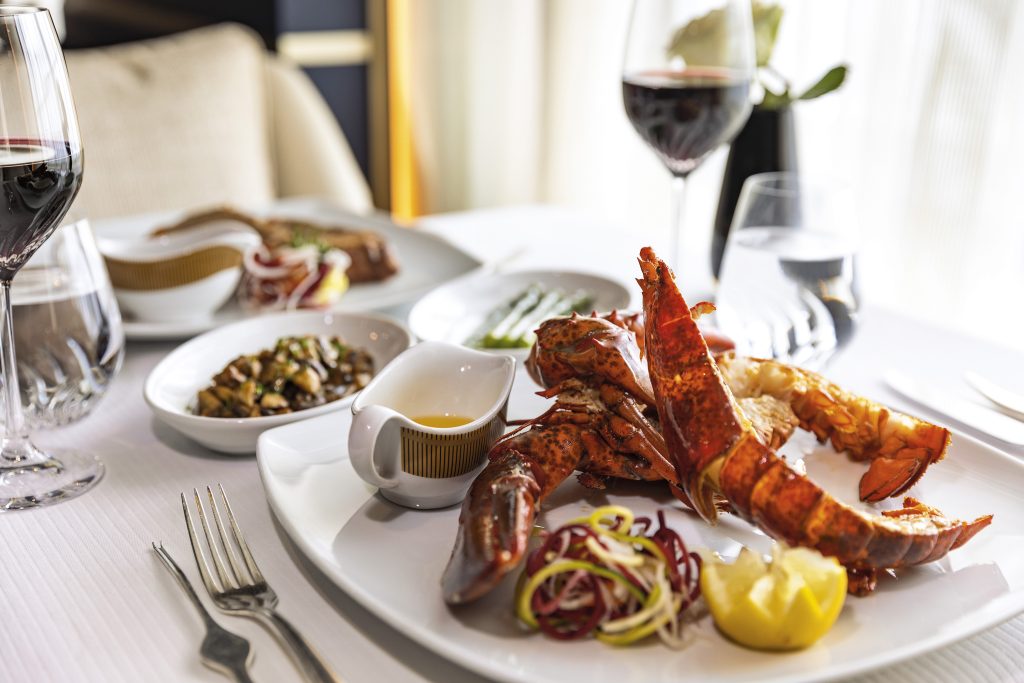 Regent Seven Seas luxury food and wine with red lobster - Sharon Carr Travel