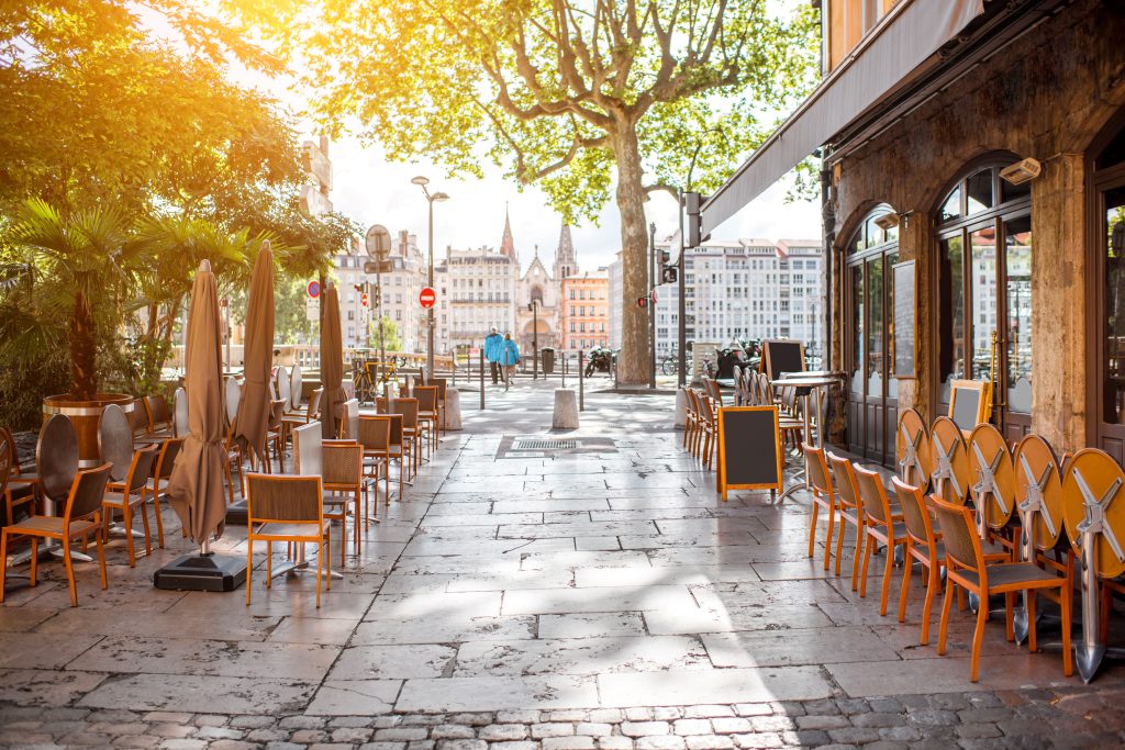 Street view with cafes near the river in the old town in Lyon city - Sharon Carr Travel